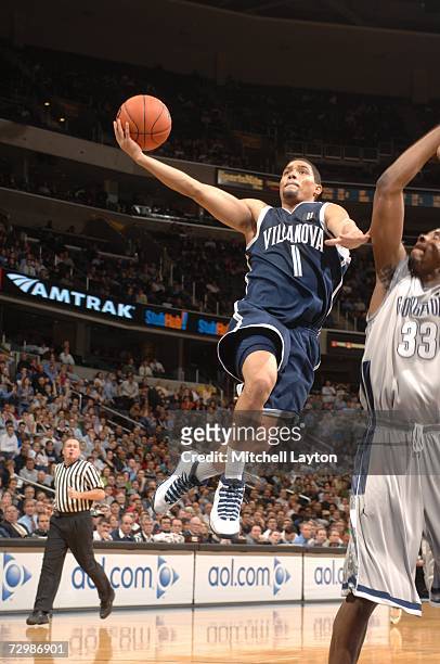 Scottie Reynolds of the Villanova Wildcats goes to the basket during a college basketball game against the Georgetown Hoyas at Verizon Center on...