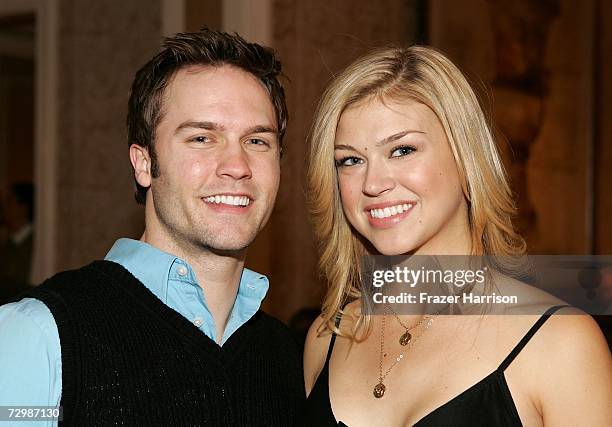 Actor Scott Porter and actress Adrianne Palicki poses inside at the 7th Annual AFI Awards luncheon held at the Four Seasons Hotel on January 12, 2007...