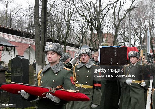 Moscow, RUSSIAN FEDERATION: Russian honor guard carry the coffin of Russian general Vladimir Kappel, who fought against the Bolsheviks in the...