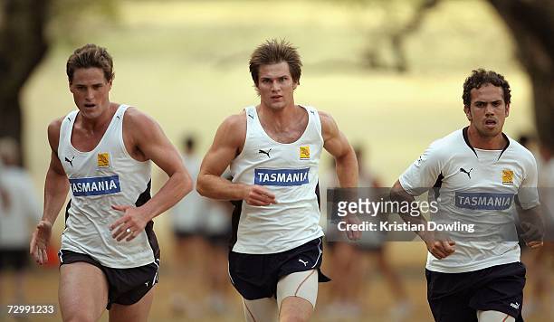 Trent Croad and Stephen Gilham of the Hawthorn Hawks run during a Hawthorn Hawks AFL training session at Fawkner Park on January 13, 2007 in...