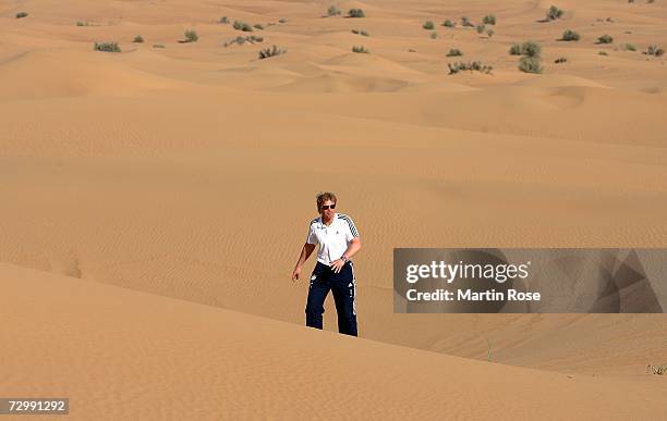 Oliver Kahn, goalkeeper of Munich, walks through the desert during the Bayern Munich desert tour on January 13, 2007 in Dubai, United Arab Emirates.