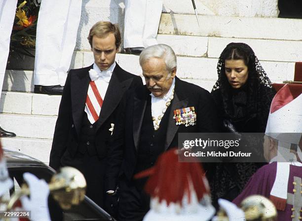 Princess Caroline of Monaco, a member of the Grimaldi family, walks with her brother Prince Albert of Monaco and her father Prince Rainier of Monaco...