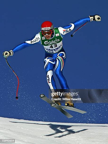 Christof Innerhofer of Italy flies over the Hundschopf jump during the Men's Audi FIS Ski World Cup Downhill race on January 13, 2007 in Wengen,...