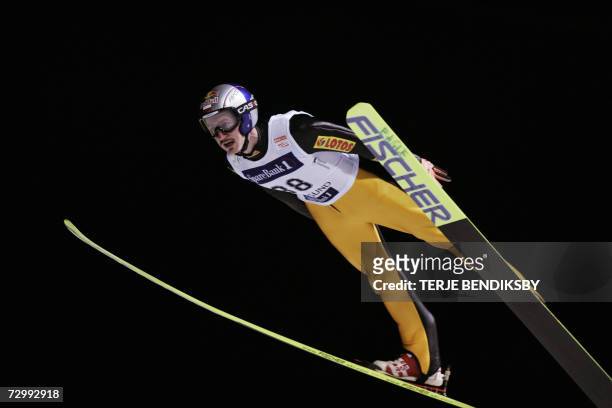 Poland's Polske Adam Malysz airbornes to place 8th in Vikersund Ski Flying Hill during the World Cup competion Saturday, 13 January 2007 . AFP...