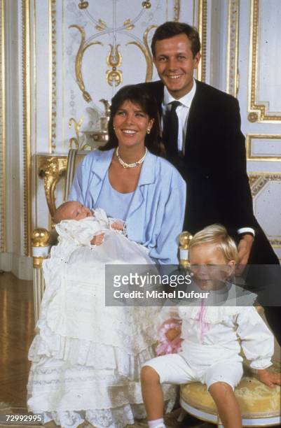 Princess Caroline of Monaco, a member of the Grimaldi family, poses with her second husband, Stefano Casiraghi, and their children in 1986 in Paris,...