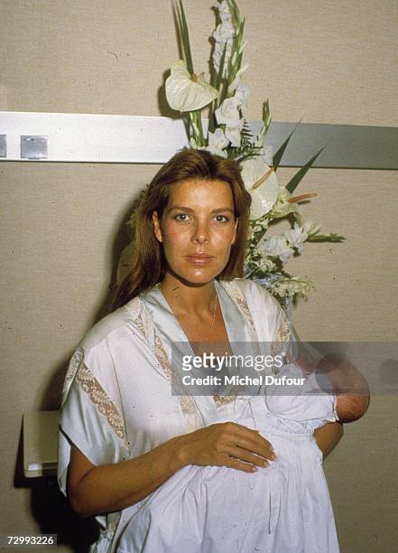 Princess Caroline of Monaco, a member of the Grimaldi family, holds her new born son Andrea in 1982 in Monaco. Princess Caroline married Ernst August...