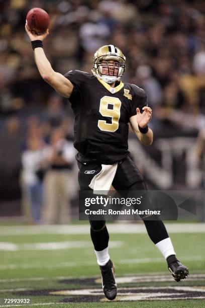 Drew Brees of the New Orleans Saints drops back to pass against the Philadelphia Eagles during the NFC divisional playoff game at the Superdome on...