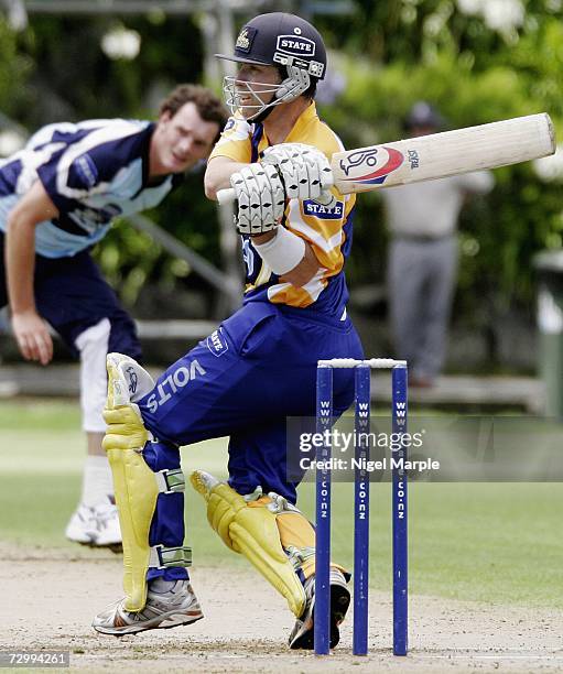 Chris Gaffaney of Otago hits a four off Kyle Mills during the Twenty20 match between Auckland and Otago at the Eden Park Outer Oval January 14, 2007...