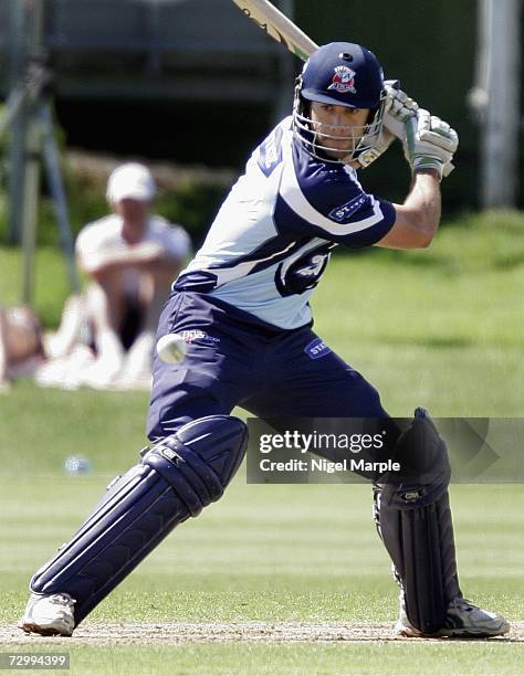 Reece Young eyes up the ball on his way to 75 runs during the Twenty20 match between Auckland and Otago at the Eden Park Outer Oval January 14, 2007...