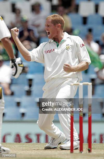 South African bowler Shaun Pollock celebrates bowling out Pakistan's batsman Younis Khan for 38 runs 14 January 2007 on the 4th day of the 1st Test...