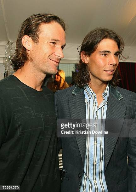 Tennis players Rafael Nadal and Carlos Moya of Spain attend the IMG Tennis Party ahead of the Australian Open, at Breezers at The Crown on January...