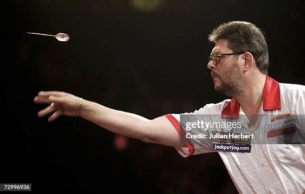 Martin Adams of England in action against Phil Nixon of England during the Final Of The BDO World Darts Championships at the Lakeside Country Club on...