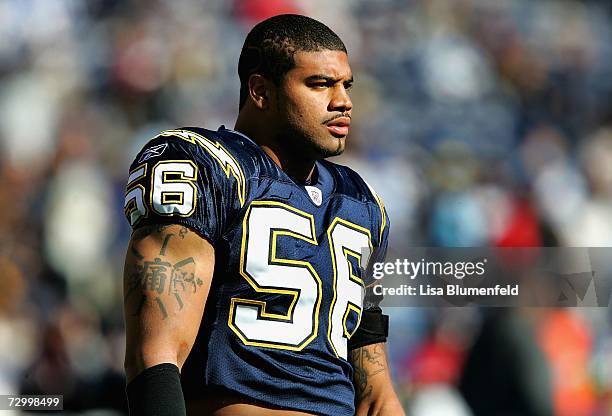 Shawne Merriman of the San Diego Chargers warms up on the field before the AFC Divisional Playoff Game against the New England Patriots held on...