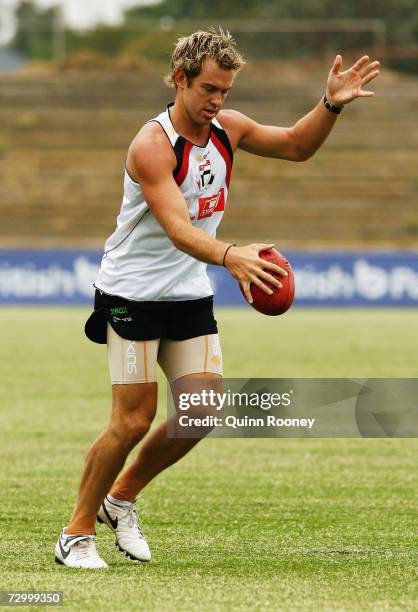 Jason Gram of the Saints kicks the ball during a Saint Kilda Saints AFL training session at Moorabbin Oval January 15, 2007 in Melbourne, Australia.