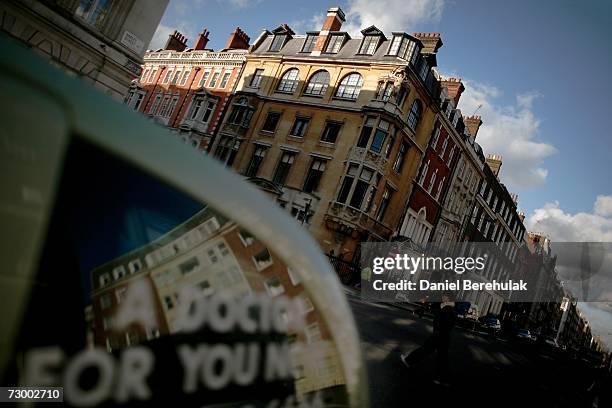 Car displaying mobile doctor services is parked on Harley St on January 15, in London, England. Britain's leading fertility clinic ARGC is under...