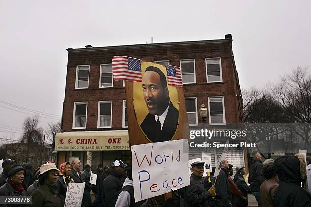 Residents march in a Martin Luther King Jr. Day parade January 15, 2007 in Bridgeport, Connecticut. King was assassinated in 1968 in Memphis and...