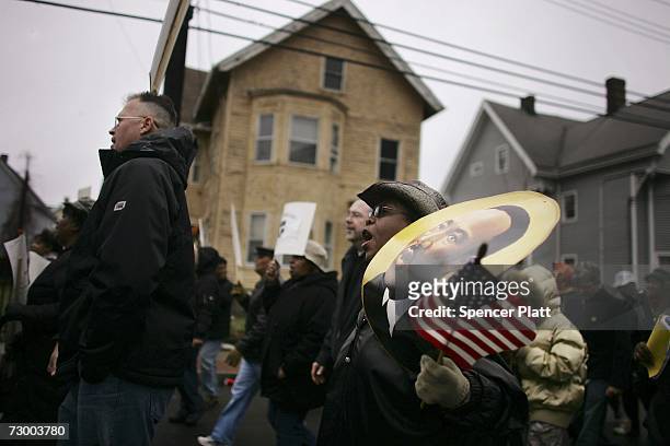Residents march in a Martin Luther King Jr. Day parade January 15, 2007 in Bridgeport, Connecticut. King was assassinated in 1968 in Memphis and...