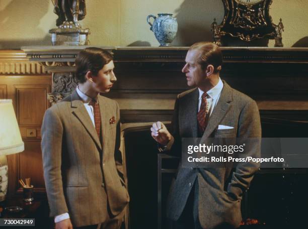 Prince Charles pictured talking with his father Prince Philip, Duke of Edinburgh at Sandringham House in Norfolk during filming of the television...