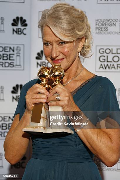Actress Helen Mirren poses with her Best Performance by an Actress in a Motion Picture - Drama award for "The Queen" and Best Performance by an...