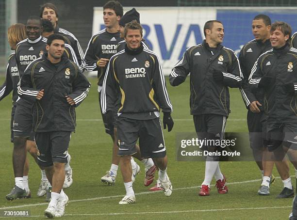David Beckham of Real Madrid warms up with Jose Antonio Reyes , Fabio Cannavaro , and Antonio Cassano during a training session at Real's training...