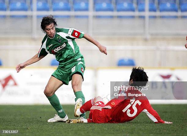 Insua and Zheno Thunze of team China vie for the ball during the friendly between the National team of China and Borussia Monchengladbach at Estadio...
