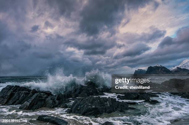 storsanden beach, flakstad, lofoten, norway - waves crashing on rocks stock pictures, royalty-free photos & images