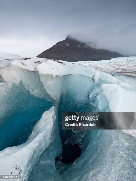 crevasse in svinafellsjokull glacier, hornafjordur, iceland - crevasse stock pictures, royalty-free photos & images