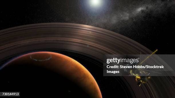 cassini sees the sun rise over the north pole of saturn. - cassini space mission stock illustrations