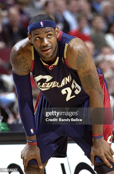 LeBron James of the Cleveland Cavaliers stands on the court during the game against the Chicago Bulls on December 30, 2006 at the United Center in...