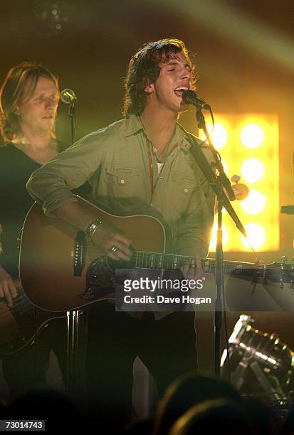 Singer James Morrison performs on stage at the BRIT Awards 2007 nominations launch party at the Hammersmith Palais on January 16, 2007 in London,...