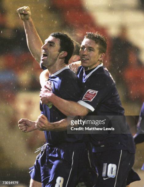 Kevin Maher of Southend celebrates his goal with team mate Freddy Eastwood during the FA Cup sponsored by E.ON Third Round replay match between...