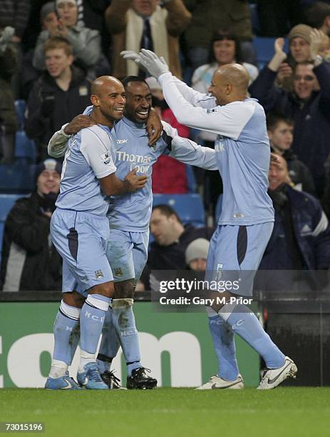 Darius Vassell of Manchester City is congratulated by his team mates after scoring during the FA Cup sponsored by E.ON Third Round Replay match...