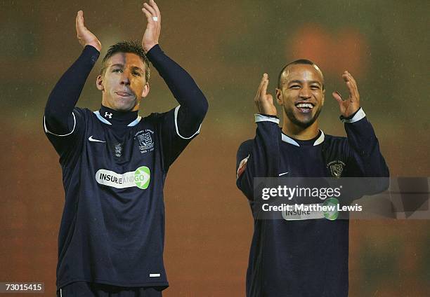 Freddy Eastwood and Lewis Hunt of Southend celebrate their win against Barnsley during the FA Cup sponsored by E.ON Third Round replay match between...