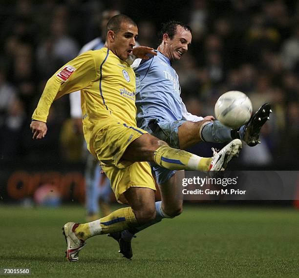 Marcus Tuogay of Sheffield Wednesday and Stephen Ireland of Manchester City in action during the FA Cup sponsored by E.ON Third Round Replay match...