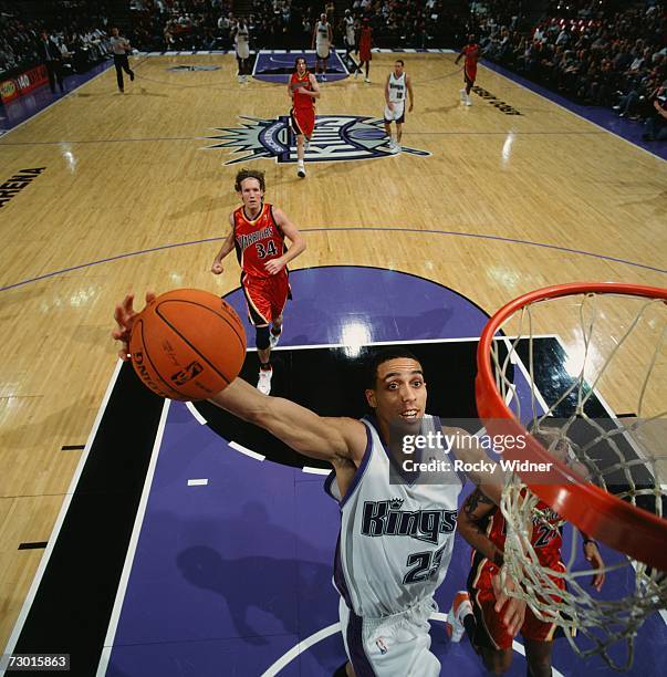 Kevin Martin of the Sacramento Kings elevates to the basket for a dunk during a game against The Golden State Warriors at Arco Arena on December 30,...