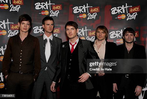 ( Richard Jones, Paul Stewart, Dan Gillespie Sells, Kevin Jeremiah and Ciaran Jeremiah of The Feeling arrive at the Brit Awards launch party at the...