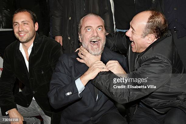 Italian actor Carlo Verdone jokes with Italian producer Aurelio De Laurentiis as they arrive to the 'Manuale d'Amore' premiere at the Adriano Cinema...