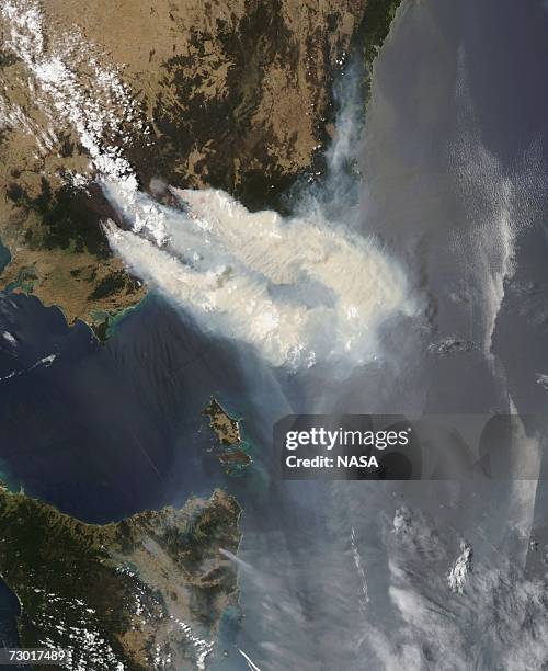 This satellite image, acquired by the MODIS on the Aqua satellite from NASA taken on January 11, 2007 shows smoke from bushfires streaming out from...
