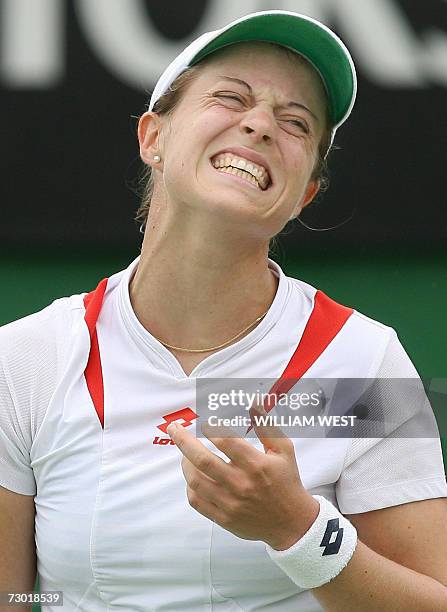 Martina Muller of Germany reacts after a missed shot against Elena Dementieva of Russia in their women's singles second round match at the Australian...