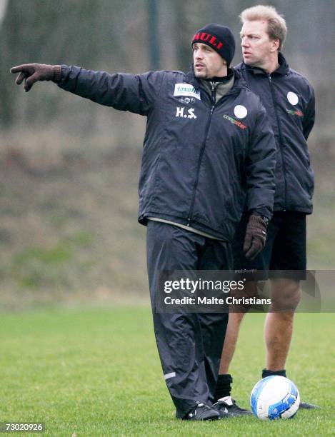 Coach Holger Stanislawski and Andre Trulsen speak during the FC St. Pauli training camp on January 17, 2007 in Schneverdingen, Germany.