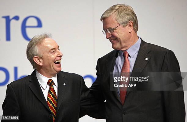 Arthur J. Higgins , Chairman of the board of the newly forming Bayer Schering Pharma AG laughs 17 January 2007 with Werner Wenning, Chairman of the...