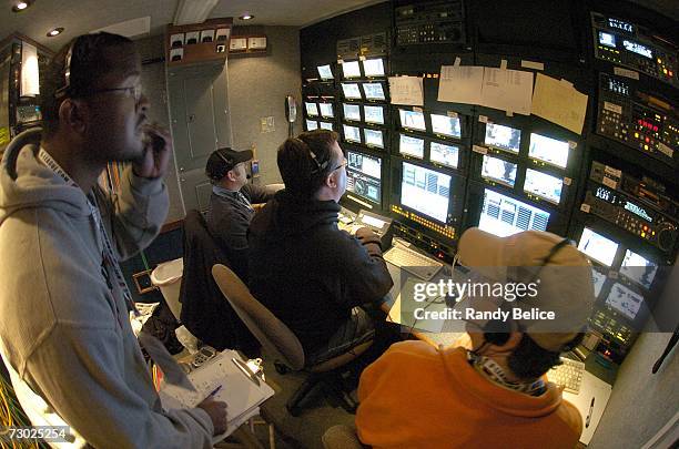 Video editors review game coverage to extract replays for inside a mobile production truck during the 2007 NBA D-League Martin Luther King, Jr....