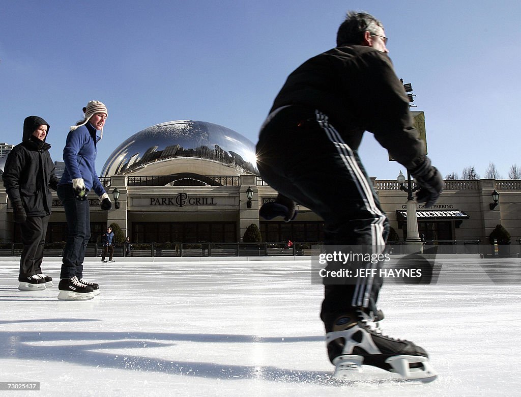 Skaters enjoy a sunny day while skating