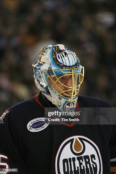 Dwayne Roloson of the Edmonton Oilers looks on against the Dallas Stars on January 4, 2007 at Rexall Place in Edmonton, Alberta, Canada. The Stars...