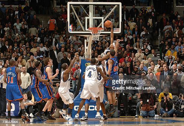 Caron Butler of the Washington Wizards scores the winning shot against the New York Knicks on January 17, 2007 at the Verizon Center in Washington,...