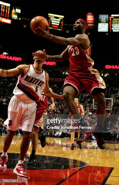 LeBron James of the Cleveland Cavaliers lays up the ball against the Portland Trail Blazers on January 17, 2006 at the Rose Garden in Portland,...