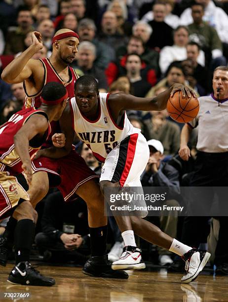 Zach Randolph of the Portland Trail Blazers dribbles the ball against Drew Gooden of the Cleveland Cavaliers on January 17, 2006 at the Rose Garden...