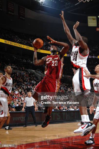 LeBron James of the Cleveland Cavaliers goes to the basket against Zach Randolph of the Portland Trail Blazers on January 17, 2007 at the Rose Garden...