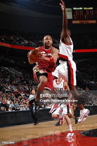 David Wesley of the Cleveland Cavaliers goes to the basket against Martell Webster of the Portland Trail Blazers on January 17, 2007 at the Rose...