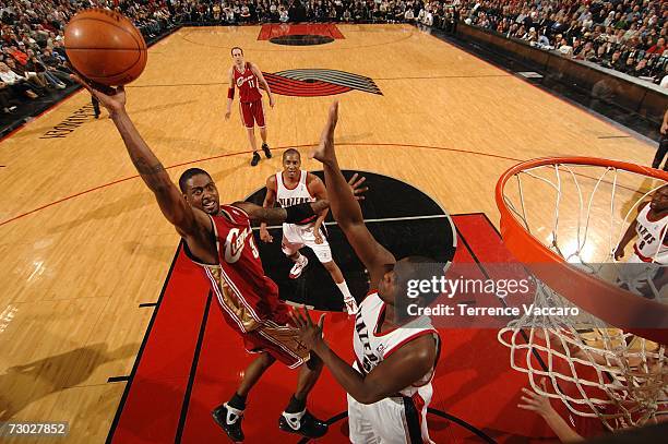 Larry Hughes of the Cleveland Cavaliers goes to the basket against Zach Randolph of the Portland Trail Blazers on January 17, 2007 at the Rose Garden...